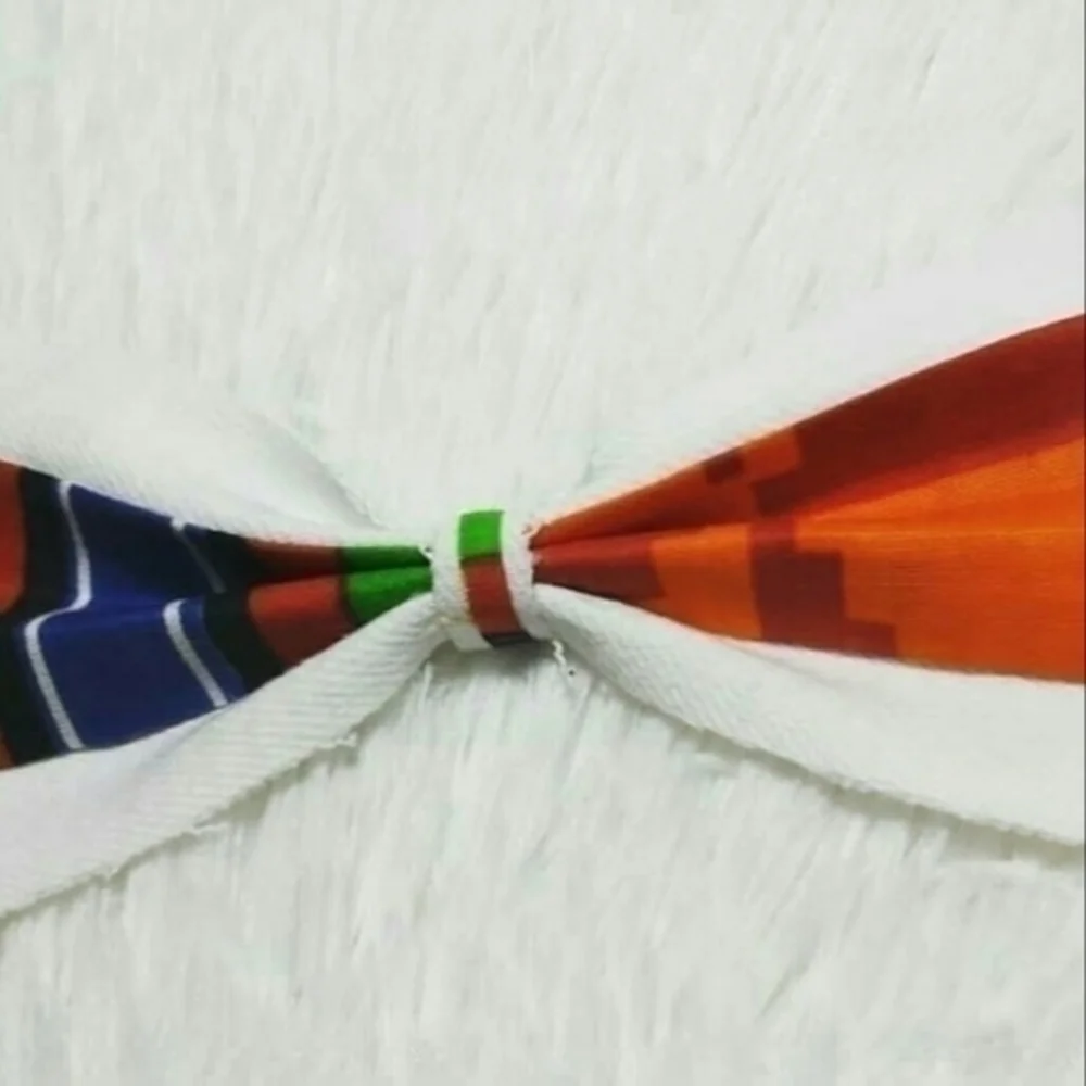 Tasty Raw Edge White Denim & Kente Bow Collar Pin